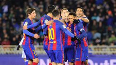 Barcelona&#039;s players celebrate after Brazilian forward Neymar scored his team&#039;s first goal during the Spanish Copa del Rey quarter final first leg football match Real Sociedad