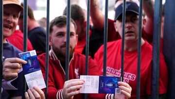 Liverpool fans stuck outside the ground show their match tickets during the UEFA Champions League Final at the Stade de France, Paris. Picture date: Saturday May 28, 2022. (Photo by Adam Davy/PA Images via Getty Images)