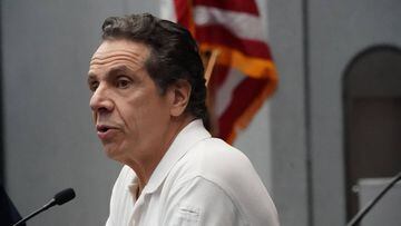 (FILES) In this file photo taken on March 27, 2020 New York Governor Andrew Cuomo speaks to the press at the Jacob K. Javits Convention Center in New York. - New York Governor Andrew Cuomo on April 16, 2020 extended the state&#039;s shutdown order until M