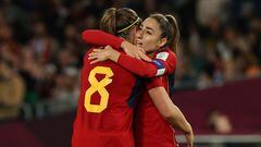 Spain's defender #19 Olga Carmona celebrates with forward #08 Mariona Caldentey after scoring her team's first goal during the Australia and New Zealand 2023 Women's World Cup final football match between Spain and England at Stadium Australia in Sydney on August 20, 2023. (Photo by STEVE CHRISTO / AFP)