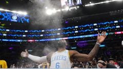 Feb 23, 2023; Los Angeles, California, USA; Los Angeles Lakers forward LeBron James (6) throws powdered chalk into the air before the game against the Golden State Warriors at Crypto.com Arena. Mandatory Credit: Kirby Lee-USA TODAY Sports