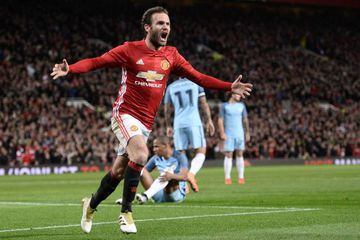 Mata celebrates after opening the scoring at Old Trafford against Manchester City