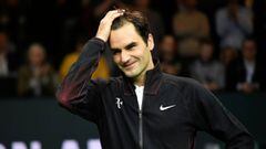 Switzerland&#039;s Roger Federer reacts as he speaks to the audience after victory over Netherlands Robin Haase in their quarter-final singles tennis match for the ABN AMRO World Tennis Tournament in Rotterdam on February 16, 2018.  Roger Federer became 