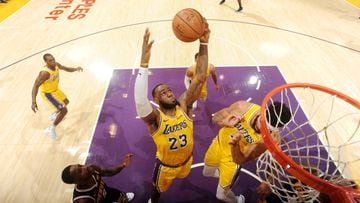 LOS ANGELES, CA - OCTOBER 2:  LeBron James #23 of the Los Angeles Lakers rebounds the ball against the Denver Nuggets during a pre-season game on October 2, 2018 at STAPLES Center in Los Angeles, California. NOTE TO USER: User expressly acknowledges and a