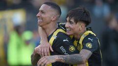 Peñarol's midfielder Kevin Mendez (L) celebrates after scoring against Nacional during the Uruguayan Apertura football tournament "clasico" match between rivals Peñarol and Nacional at the Campeon del Siglo stadium in Montevideo, on April 1, 2023. (Photo by Dante Fernandez / AFP) (Photo by DANTE FERNANDEZ/AFP via Getty Images)