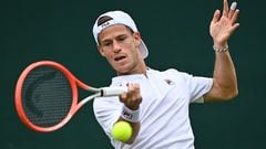Argentina's Diego Schwartzman returns the ball Britain's Liam Broady toduring their men's singles tennis match on the fourth day of the 2022 Wimbledon Championships at The All England Tennis Club in Wimbledon, southwest London, on June 30, 2022. (Photo by Glyn KIRK / AFP) / RESTRICTED TO EDITORIAL USE