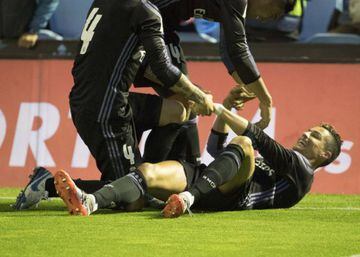 Cristiano Ronaldo celebrates with Real Madrid teammates after two goals against Celta Vigo.