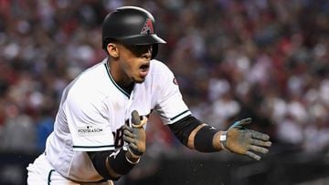 PHOENIX, AZ - OCTOBER 04: Ketel Marte #4 of the Arizona Diamondbacks reacts after hitting a RBI triple during the bottom of the second inning of the National League Wild Card game at Chase Field on October 4, 2017 in Phoenix, Arizona.   Norm Hall/Getty Images/AFP == FOR NEWSPAPERS, INTERNET, TELCOS &amp; TELEVISION USE ONLY ==