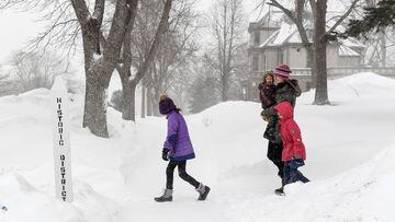 Minnesota and nearby states are braced for a spell of heavy snow that will force road closures and flight cancellations.