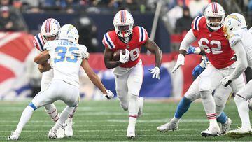 New England Patriots running back Rhamondre Stevenson (38) rushes against the Los Angeles Chargers
