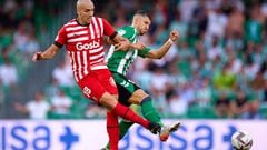 SEVILLE, SPAIN - SEPTEMBER 18: Guido Rodriguez of Real Betis competes for the ball with Oriol Romeu of Girona FC during the LaLiga Santander match between Real Betis and Girona FC at Estadio Benito Villamarin on September 18, 2022 in Seville, Spain.