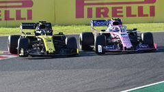 Renault&#039;s Australian driver Daniel Ricciardo (L) goes side-by-side with Racing Point&#039;s Canadian driver Lance Stroll (R) during the Formula One Japanese Grand Prix in Suzuka on October 13, 2019. (Photo by TOSHIFUMI KITAMURA / AFP)