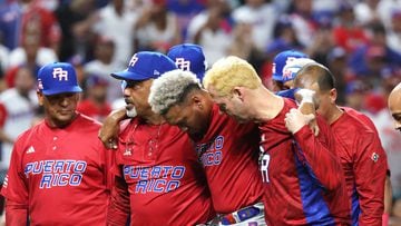 Edwin Diaz #39 of Team Puerto Rico is carried off the field after sustaining an injury while celebrating a 5-2 win against Team Dominican Republic during their World Baseball Classic Pool D game at loanDepot park on March 15, 2023 in Miami, Florida.