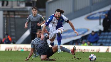 BLACKBURN, ENGLAND - JANUARY 01: Blackburn Rovers' Ben Brereton Diaz is tackled by Cardiff City's Andy Rinomhota 
 during the Sky Bet Championship between Blackburn Rovers and Cardiff City at Ewood Park on January 1, 2023 in Blackburn, United Kingdom. (Photo by Lee Parker - CameraSport via Getty Images)