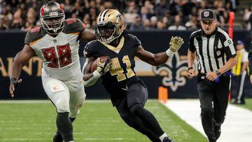 Nov 5, 2017; New Orleans, LA, USA; New Orleans Saints running back Alvin Kamara (41) runs from Tampa Bay Buccaneers defensive tackle Clinton McDonald (98) on a 33 yard touchdown during the second quarter of a game at the Mercedes-Benz Superdome. Mandatory Credit: Derick E. Hingle-USA TODAY Sports