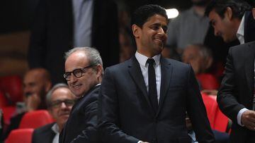 Paris saint-Germain's president Nasser Al-Khelaifi (R) attends the UEFA Champions League 1st round day 3 group H football match between SL Benfica and Paris Saint-Germain, at the Luz stadium in Lisbon on October 5, 2022. (Photo by FRANCK FIFE / AFP)