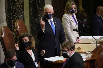 Vice President Mike Pence continues the count of electoral votes in the House Chamber during a reconvening of a joint session of Congress on January 07, 2021 in Washington, DC. Members of Congress returned to the House Chamber after being evacuated when p