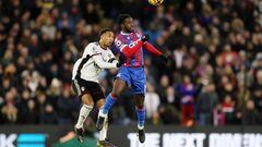 LONDON, ENGLAND - DECEMBER 26: Jeffrey Schlupp of Crystal Palace competes for a header with Kenny Tete of Fulham during the Premier League match between Crystal Palace and Fulham FC at Selhurst Park on December 26, 2022 in London, England. (Photo by Henry Browne/Getty Images)