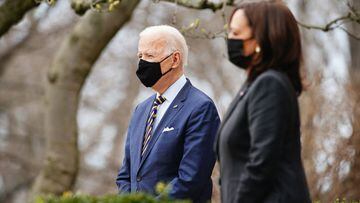 US President Joe Biden (L) and Vice President Kamala Harris (R) listen to introductory speeches before delivering remarks on the American Rescue Plan from the Rose Garden of the White House in Washington DC, USA, 12 March 2021. President Biden signed the 