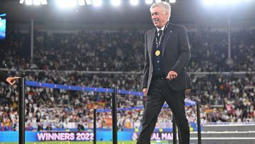 Carlo Ancelotti, coach of Real Madrid, leaves the pitch of the Helsinki Olympic Stadium smiling after winning the European Super Cup with Real Madrid.