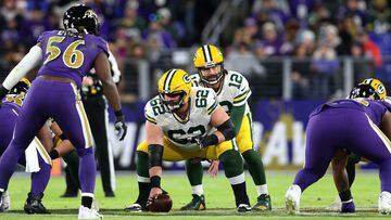 BALTIMORE, MARYLAND - DECEMBER 19: Quarterback Aaron Rodgers #12 waits to take the snap from center Lucas Patrick #62 of the Green Bay Packers in the second half against the Baltimore Ravens at M&amp;T Bank Stadium on December 19, 2021 in Baltimore, Maryl