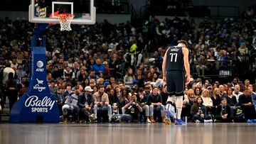 Feb 2, 2023; Dallas, Texas, USA; Dallas Mavericks guard Luka Doncic (77) walks back up the court during the first half of the game between the Mavericks and the New Orleans Pelicans at the American Airlines Center. Mandatory Credit: Jerome Miron-USA TODAY Sports