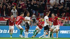 Hungary's defender Zsolt Nagy (C) celebrates scoring the opening goal with his teammates during the UEFA Nations League football match Hungary v Germany at the Puskas Arena in Budapest on June 11, 2022. (Photo by Attila KISBENEDEK / AFP)