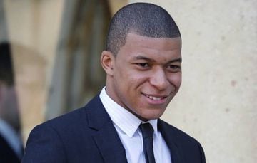 Kylian Mbappe after a meeting with French President Emmanuel Macron and Liberia's recently-elected President George Weah at the Elysee Palace in Paris.