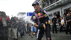 Red Bull&#039;s Australian driver Mark Webber celebrates his victory in front of his team&#039;s motorhome in the paddock of the Nurburgring racetrack on July 12, 2009 in Nurburg, after the German Formula One Grand Prix. Mark Webber won the race ahead of 