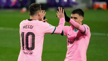 Barcelona&#039;s Argentine forward Lionel Messi (L) celebrates with Barcelona&#039;s Spanish midfielder Pedri after scoring a goal during the Spanish league football match between Real Valladolid FC and FC Barcelona at the Jose Zorilla stadium in Valladol