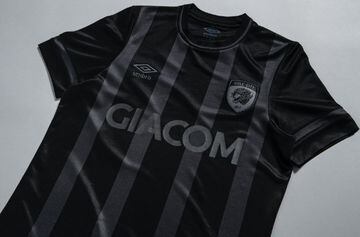 A smart 'black-out' effort from the English side with a subtle dark grey and black striped shirt offset with the club badge in black to complete the overall effect.