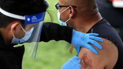 A man receives a dose of the Johnson &amp; Johnson coronavirus vaccine during a walk-up clinic at the Kennedy Center&#039;s outdoor Reach area on May 06, 2021 in Washington, DC. 