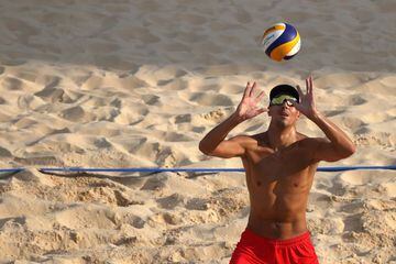 Oleg Stoyanovskiy of Team Russian Federation Men's Beach Volleyball sets a ball during practice ahead of the Tokyo 2020 Olympic Games.