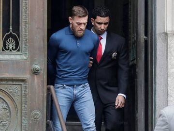 REFILE - ADDING FIRST NAME MMA fighter Conor McGregor walks out of the 78th police precinct after charges were laid against him following a late night melee in the Brooklyn borough of New York City, New York, U.S., April 6, 2018. REUTERS/Jeenah Moon