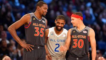 Feb 19, 2017; New Orleans, LA, USA; Western Conference forward Kevin Durant of the Golden State Warriors (35),  Eastern Conference forward Kyrie Irving of the Cleveland Cavaliers (2) and Western Conference guard Stephen Curry of the Golden State Warriors 