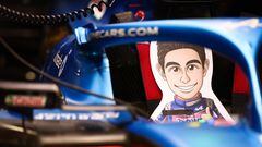 SUZUKA, JAPAN - OCTOBER 07: The car of Esteban Ocon of France and Alpine F1 is pictured with a cardboard cutout in his seat during practice ahead of the F1 Grand Prix of Japan at Suzuka International Racing Course on October 07, 2022 in Suzuka, Japan. (Photo by Clive Rose/Getty Images)
