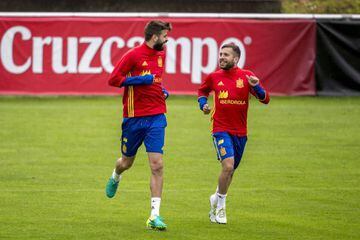 Piqué and Jordi Alba looks up to team-mate Piqué.
