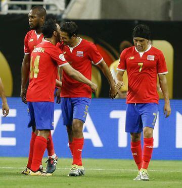 Borges (second right) celebrates with Randall Azofeifa (number 14) and Christian Bolanos (right) after scoring for Costa Rica.