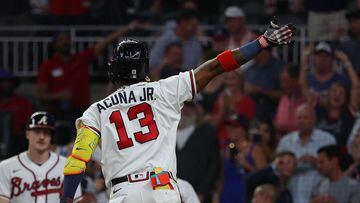 ATLANTA, GEORGIA - SEPTEMBER 26: Ronald Acuna Jr. #13 of the Atlanta Braves reacts as he crosses home plate after hitting a two-run homer in the seventh inning against the Chicago Cubs at Truist Park on September 26, 2023 in Atlanta, Georgia.   Kevin C. Cox/Getty Images/AFP (Photo by Kevin C. Cox / GETTY IMAGES NORTH AMERICA / Getty Images via AFP)
