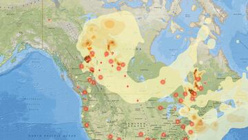 Interactive map of North America showing where the fires are burning and where the smoke is expected to move in the coming days, along with particle levels.