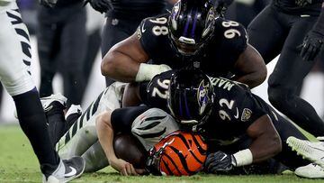 BALTIMORE, MARYLAND - NOVEMBER 16: Justin Madubuike #92 of the Baltimore Ravens sacks Jake Browning #6 of the Cincinnati Bengals during the fourth quarter of the game at M&T Bank Stadium on November 16, 2023 in Baltimore, Maryland.   Patrick Smith/Getty Images/AFP (Photo by Patrick Smith / GETTY IMAGES NORTH AMERICA / Getty Images via AFP)