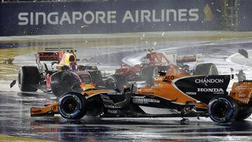 The car&#039;s of McLaren driver Fernando Alonso of Spain, Red Bull driver Max Verstappen of the Netherlands and Ferrari driver Kimi Raikkonen of Finland after colliding at the start of the Singapore Formula One Grand Prix on the Marina Bay City Circuit Singapore, Sunday, Sept. 17, 2017. (AP Photo/Wong Maye-E)