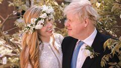 (FILE PHOTO) Prime Minister Boris Johnson And Carrie Johnson Are Expecting Their Second Child. LONDON, UNITED KINGDOM - MAY 29: (Alternate crop of #1233183330)  In this handout image released by 10 Downing Street, Prime Minister Boris Johnson poses with his wife Carrie Johnson in the garden of 10 Downing Street following their wedding at Westminster Cathedral, May 29, 2021 in London, England. The secretly planned wedding took place in a small ceremony on Saturday afternoon. Johnson is the first Prime Minister to get married while in office in nearly 200 years. (Photo by Rebecca Fulton / Downing Street via Getty Images)