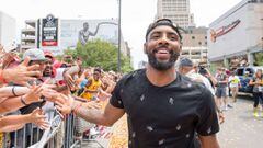 CLEVELAND, OH - JUNE 22: Kyrie Irving #2 of the Cleveland Cavaliers celebrates with fans during the Cleveland Cavaliers 2016 championship victory parade and rally on June 22, 2016 in Cleveland, Ohio. NOTE TO USER: User expressly acknowledges and agrees that, by downloading and/or using this photograph, user is consenting to the terms and conditions of the Getty Images License Agreement.   Jason Miller/Getty Images/AFP == FOR NEWSPAPERS, INTERNET, TELCOS &amp; TELEVISION USE ONLY ==