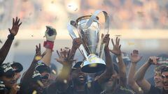 LOS ANGELES, CA - NOVEMBER 05: Kellyn Acosta #23 of LAFC lifts the trophy to celebrate after winning the MLS Cup Final match between Philadelphia Union and LAFC as part of the MLS Cup Final 2022 at Banc of California Stadium on November 5, 2022 in Los Angeles, California.