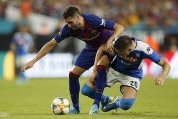 MIAMI, FLORIDA - AUGUST 07: Abel Ruiz #29 of FC Barcelona battles for possession of the ball with Piotr Zielinski #20 of SSC Napoli during the second half of a pre-season friendly match at Hard Rock Stadium on August 07, 2019 in Miami, Florida