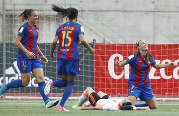 Barcelona players celebrate with goal scorer Gemma