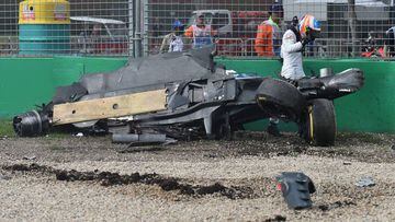 Fernando Alonso emerges from the wreck of his car in Australia. 