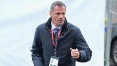 Liverpool great Carragher apologises for spitting at Man United fan