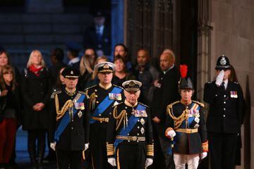 Britain's King Charles III, Britain's Princess Anne, Princess Royal, Britain's Prince Andrew, Duke of York, and Britain's Prince Edward, Earl of Wessex mount a vigil around the coffin of Queen Elizabeth II